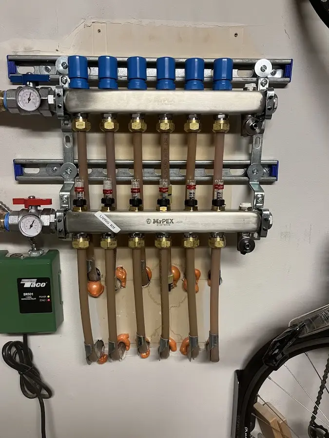 Plumber performing Water Heater Repair at a residential property in Lake Villa